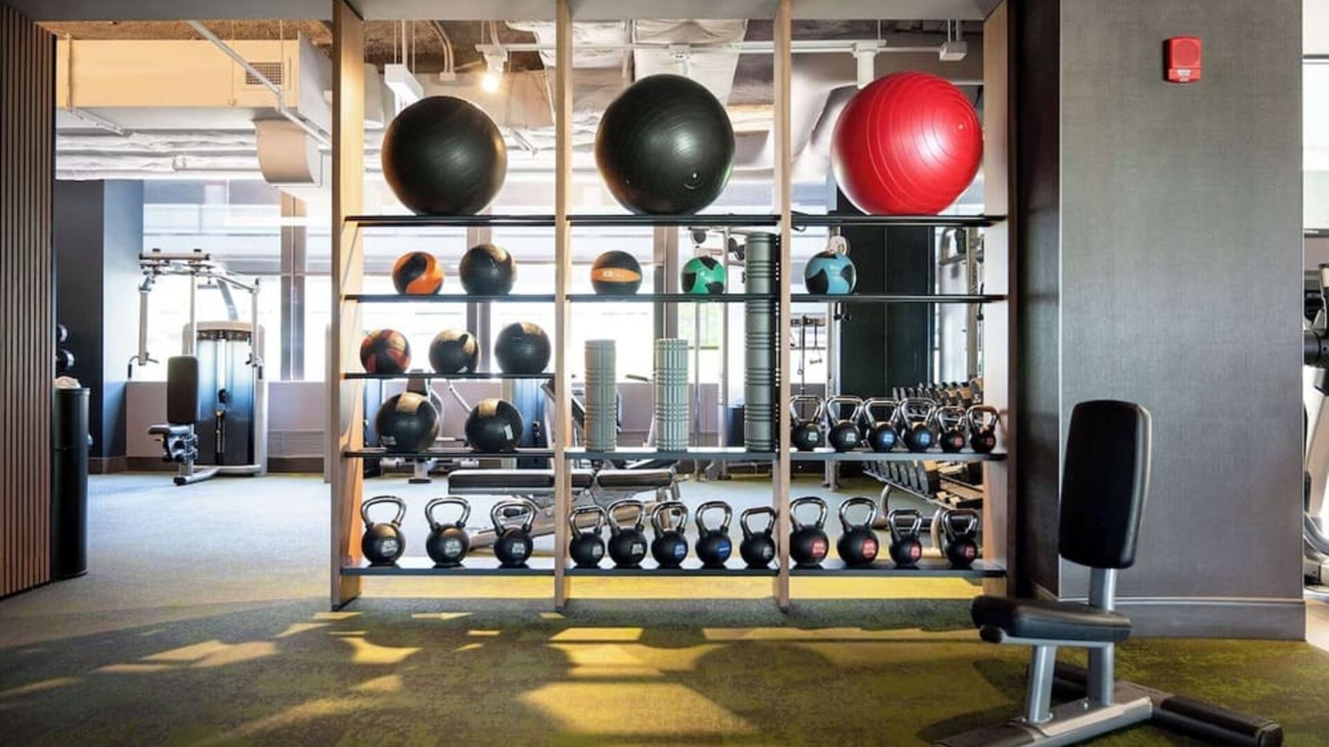 Fully equipped fitness center at Hilton Chicago O'Hare Airport.