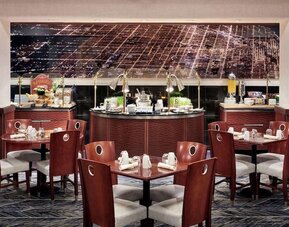 Dining area perfect for coworking at Hilton Chicago O'Hare Airport.