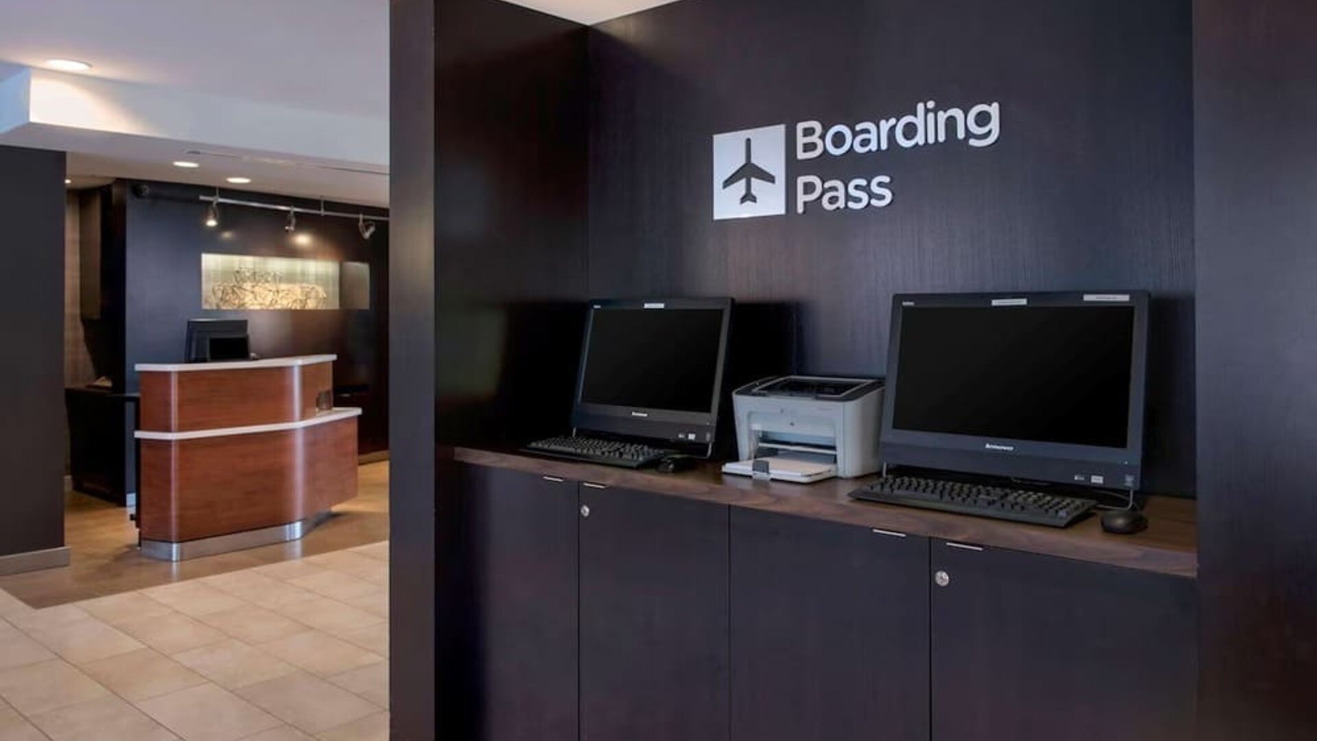 Business center with computers and printer at Sonesta Select Boston Milford.