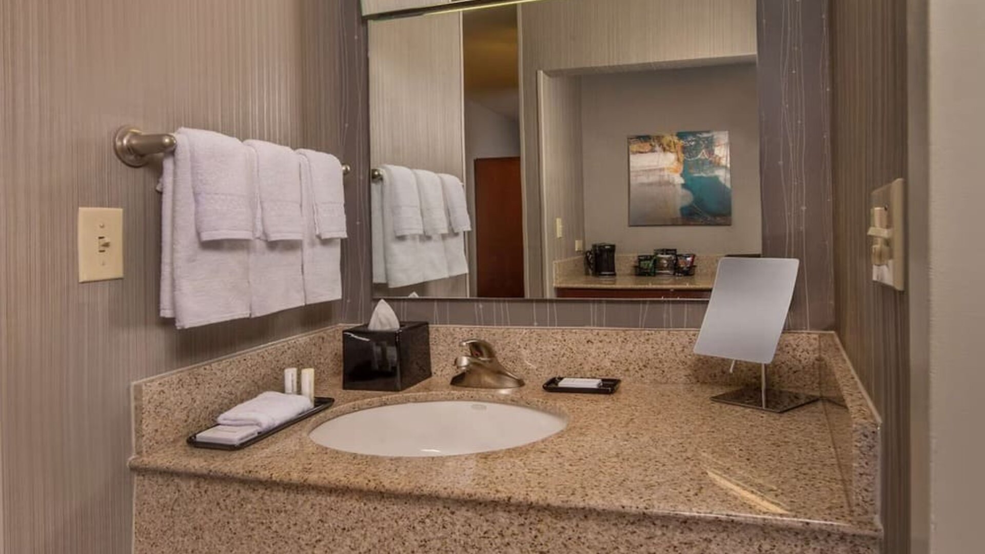 Private guest bathroom with free toiletries at Sonesta Select Arlington Rosslyn.