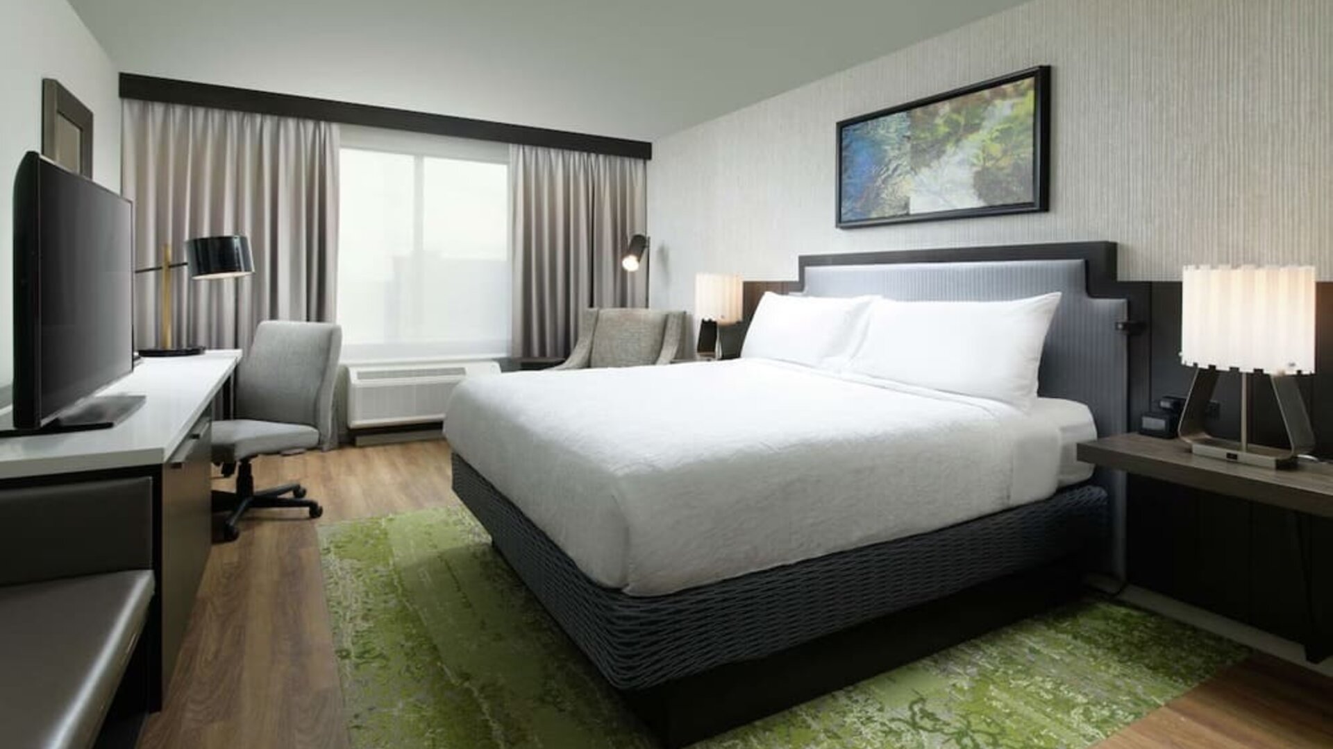 Day use room with work desk and natural light at Hilton Garden Inn Memphis Downtown.