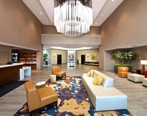 Lobby and coworking lounge at Embassy Suites By Hilton Seattle-North-Lynnwood.
