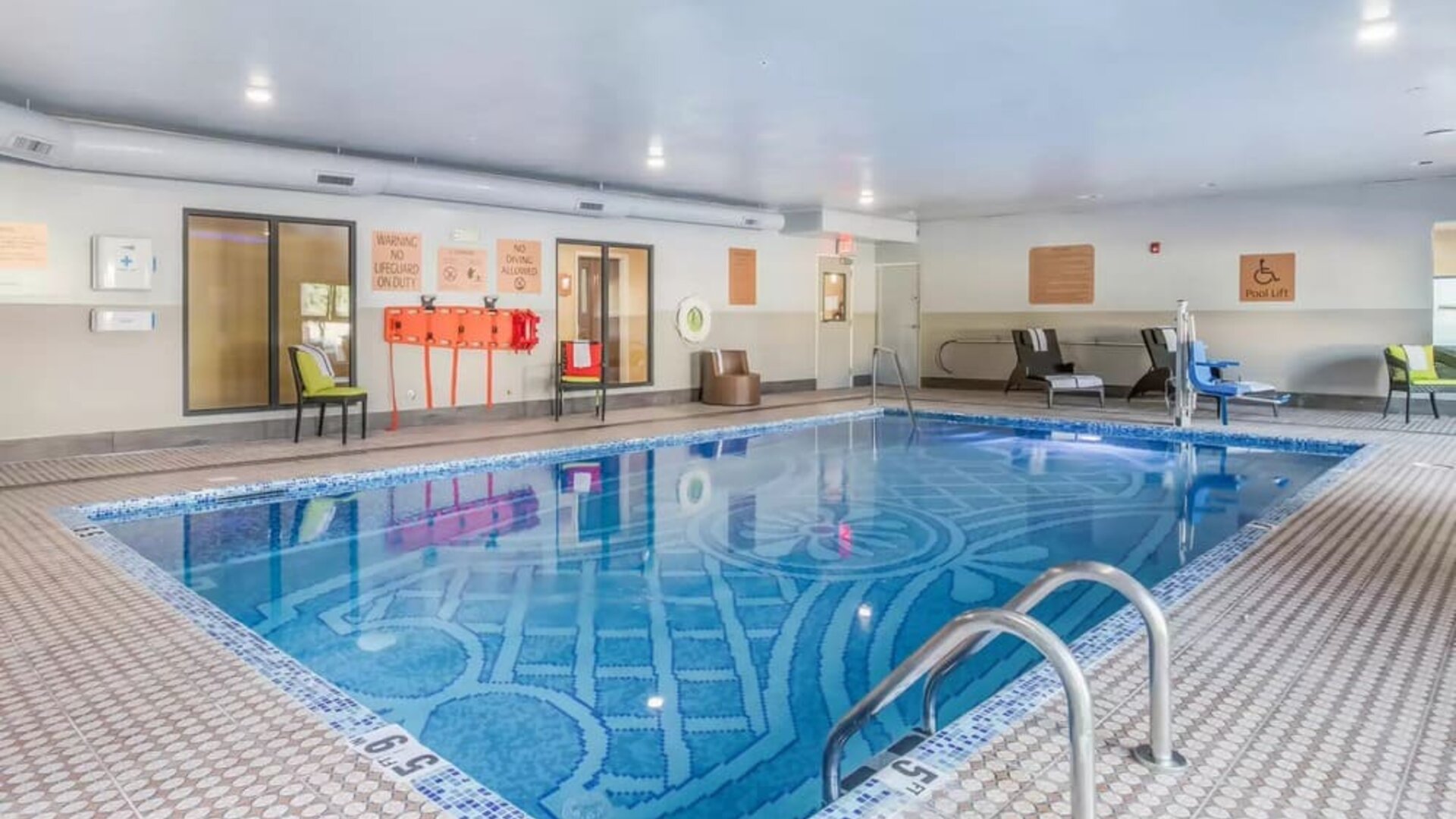 Refreshing indoor pool at The Leo Collection, An Ascend Collection Hotel.