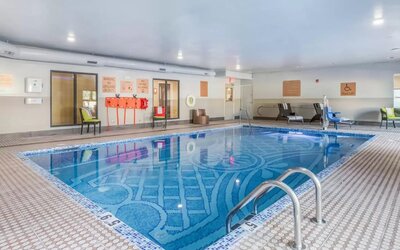 Refreshing indoor pool at The Leo Collection, An Ascend Collection Hotel.