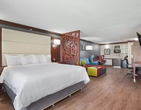 Day use room with living area at The Leo Collection, An Ascend Collection Hotel.