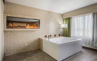 Bath tub inside day use room at The Leo Collection, An Ascend Collection Hotel.