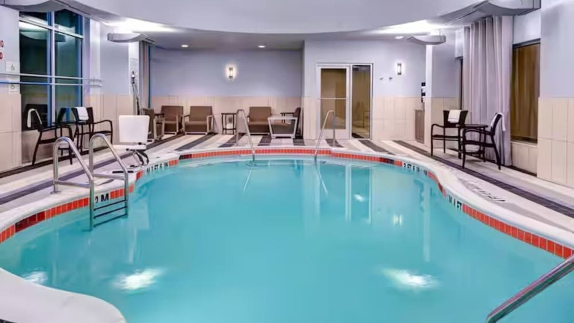 Refreshing indoor pool at Hampton Inn & Suites By Hilton Atlanta Perimeter Dunwoody.