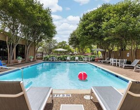 Relaxing outdoor pool at Doubletree By Hilton Houston Medical Center Hotel & Suites.