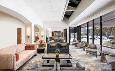 Lobby and coworking lounge at Doubletree By Hilton Houston Medical Center Hotel & Suites.