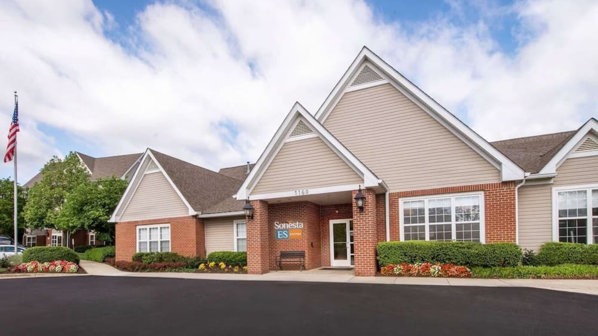 Exterior and parking area at Sonesta ES Suites Baltimore BWI Airport.
