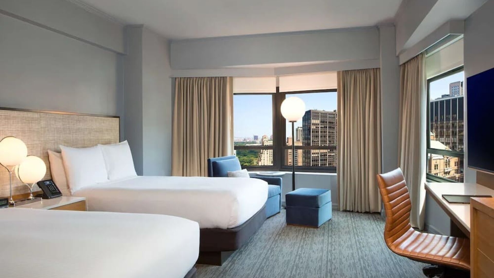 Day use twin room with work desk at New York Hilton Midtown.