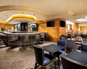 Hotel bar and lounge area at New York Hilton Midtown.