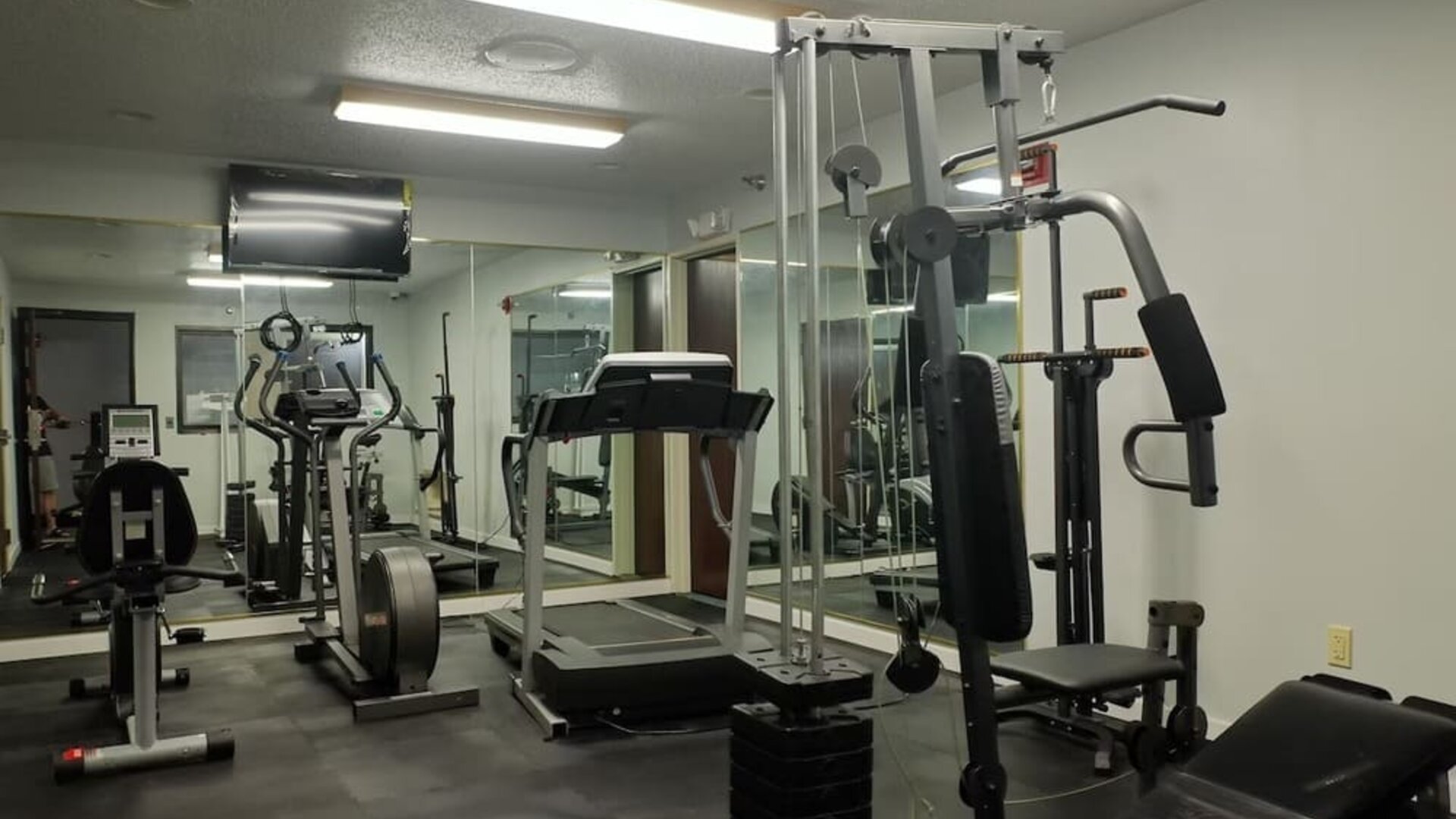 Fitness center at Quality Inn & Suites Woodstock Near Lake Geneva.