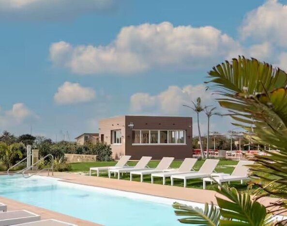 Outdoor pool at Terradamari Resort & Spa Marina Di Modica.