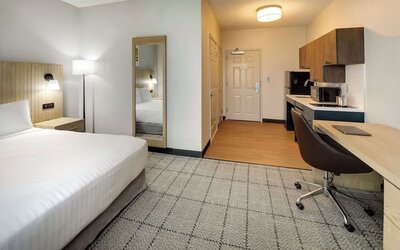 Day use room with work desk and private bathroom at Sonesta Simply Suites Baltimore BWI Airport.
