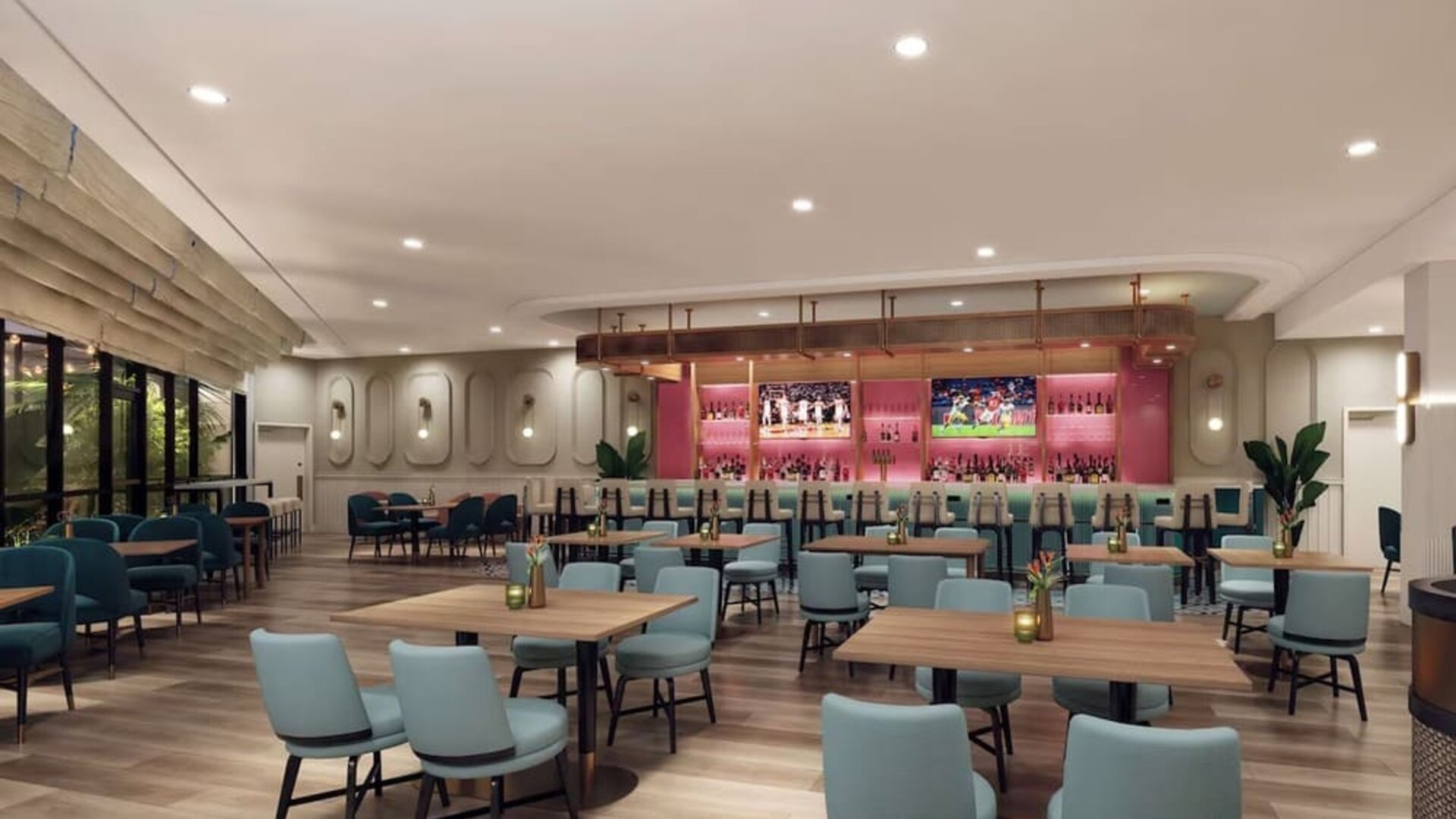 Hotel bar with lounge area at Sonesta Miami Airport.