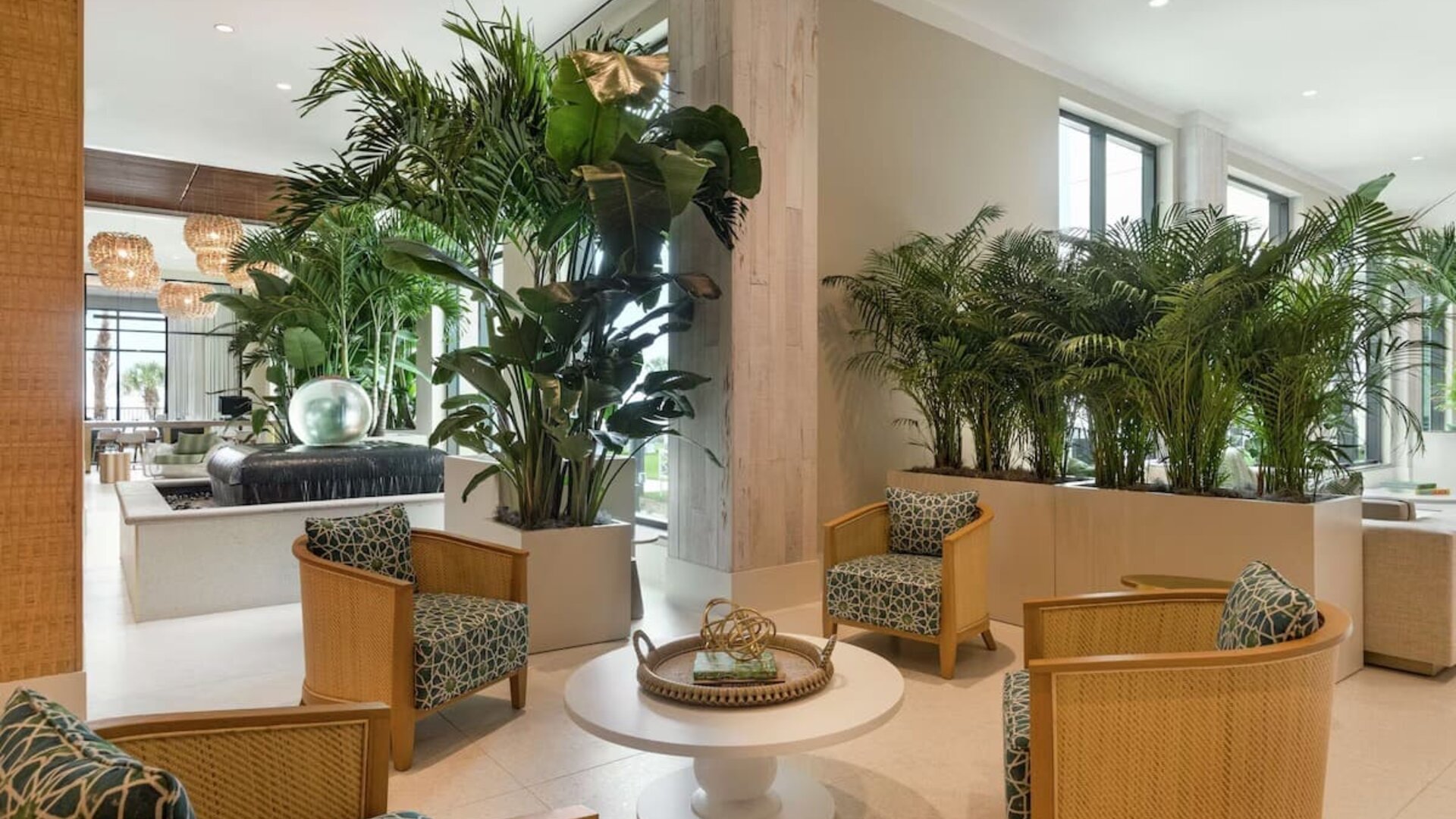 Comfortable lobby lounge area and workspace at Embassy Suites By Hilton Panama City Beach Resort.