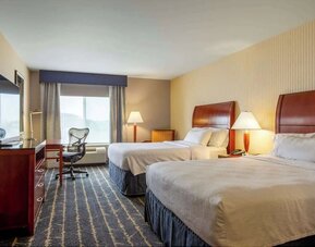 Day use twin room with work desk at Hilton Garden Inn Milwaukee Northwest Conference Center.