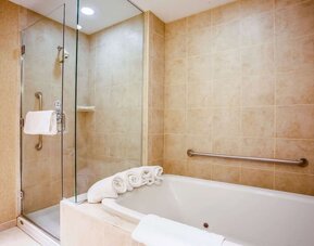 Private guest bathroom at Hilton Garden Inn Milwaukee Northwest Conference Center.