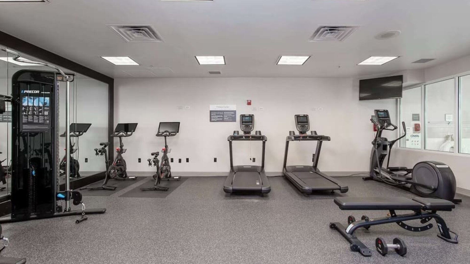 Well equipped fitness center at Hilton Garden Inn Milwaukee Northwest Conference Center.