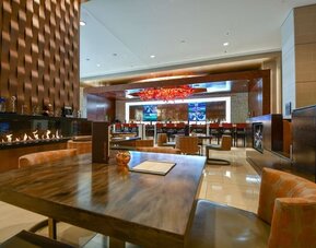 Dining area perfect for coworking at Hilton Dallas/ Plano Granite Park.