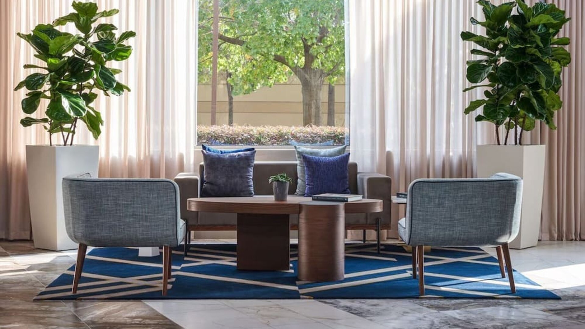Lobby and coworking lounge at The Chifley Houston, Tapestry Collection By Hilton.