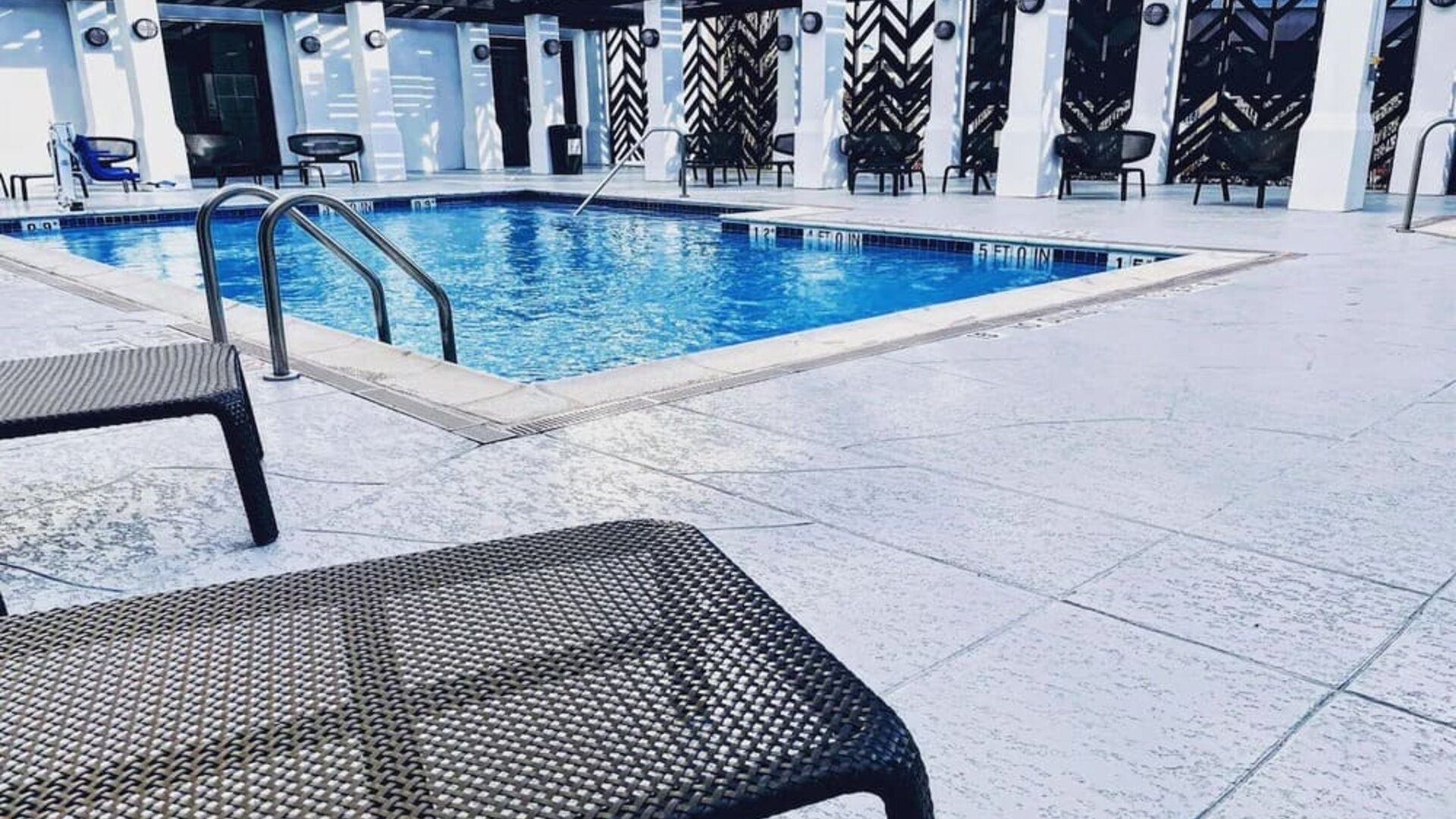 Refreshing outdoor pool at The Chifley Houston, Tapestry Collection By Hilton.