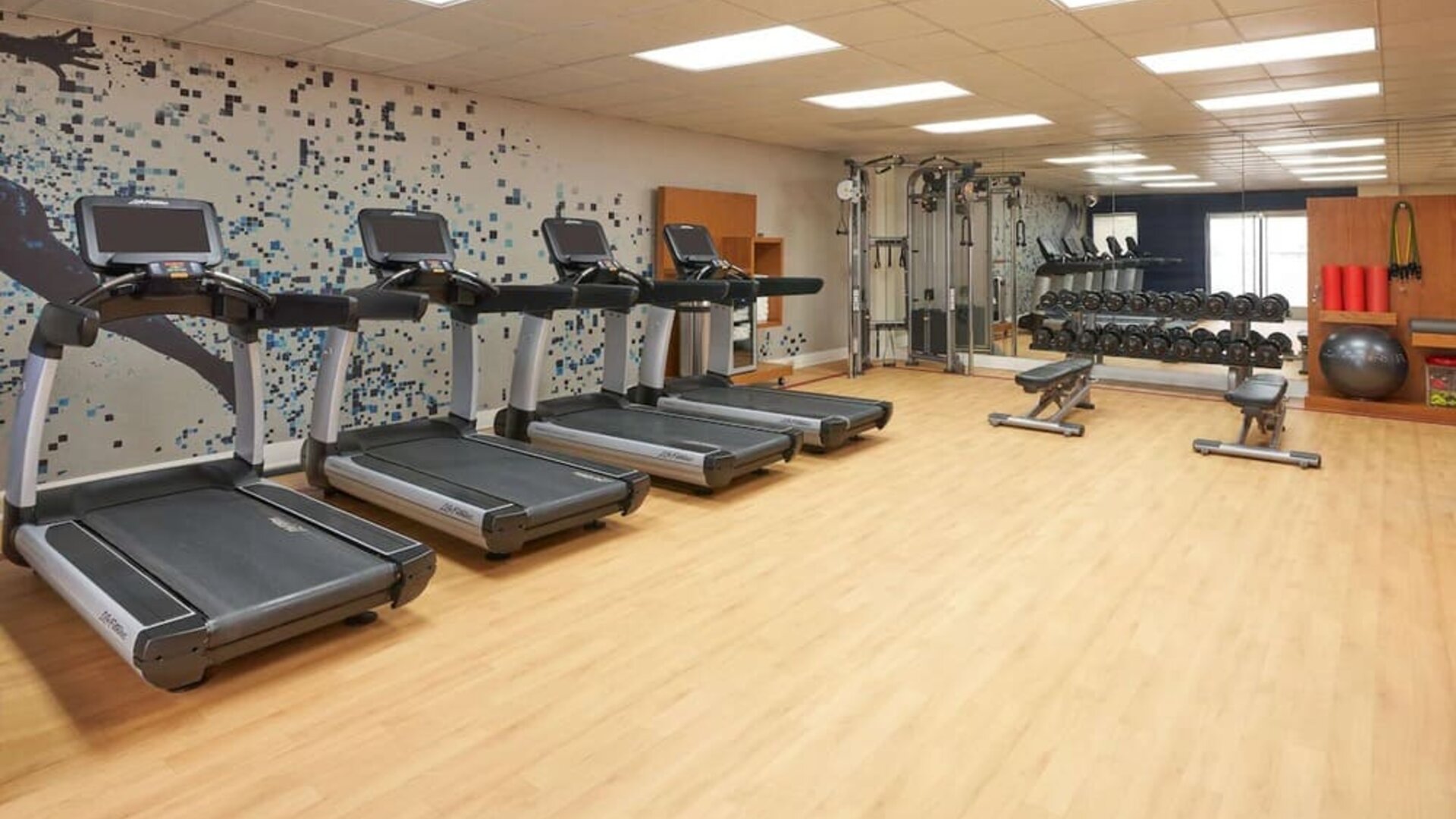 Fitness center at The Chifley Houston, Tapestry Collection By Hilton.