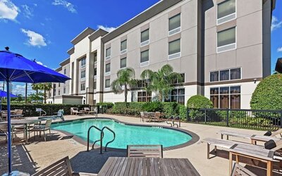 Outdoor pool at Hampton Inn & Suites Houston-Bush Intercontinental Aprt.