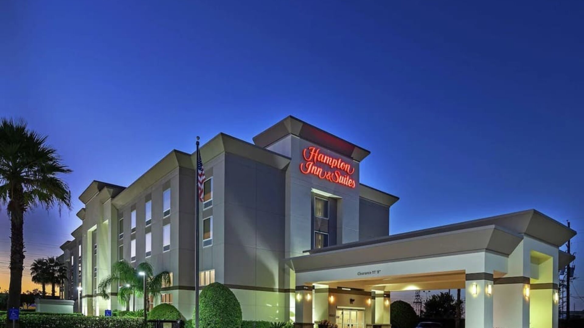 Hotel exterior at night at Hampton Inn & Suites Houston-Bush Intercontinental Aprt.