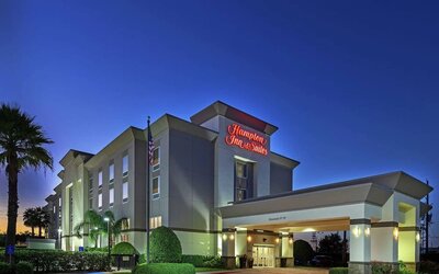Hotel exterior at night at Hampton Inn & Suites Houston-Bush Intercontinental Aprt.