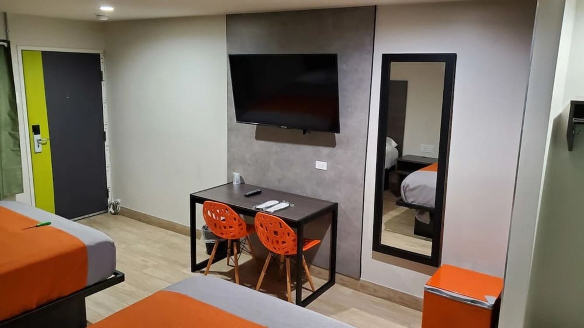 Day use room with TV at Exclusivo Inn & Suites. 