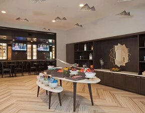 Dining room at Homewood Suites By Hilton Los Angeles International Airport.