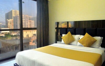 Cozy king room at THE BEST HOTEL MUMBAI.