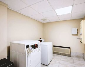 Laundry service available for guests at Hotel Inn Milwaukee.
