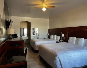 Day use twin room with work desk at Casa Rosa Inn.