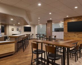 Coworking area and bar at DoubleTree By Hilton Fort Worth South.