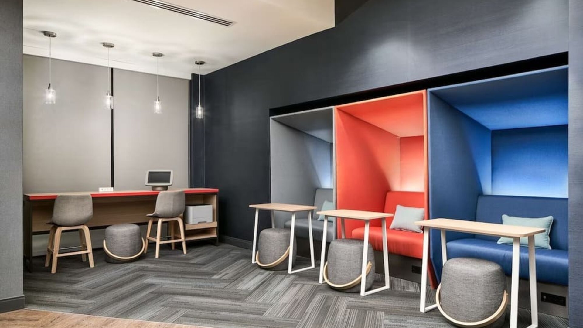 Coworking pods at Tru By Hilton Ft. Lauderdale Airport.