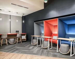 Coworking pods at Tru By Hilton Ft. Lauderdale Airport.