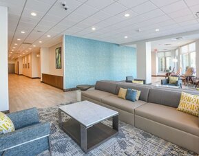 Lounge seating area at Hilton Garden Inn Cincinnati Midtown.