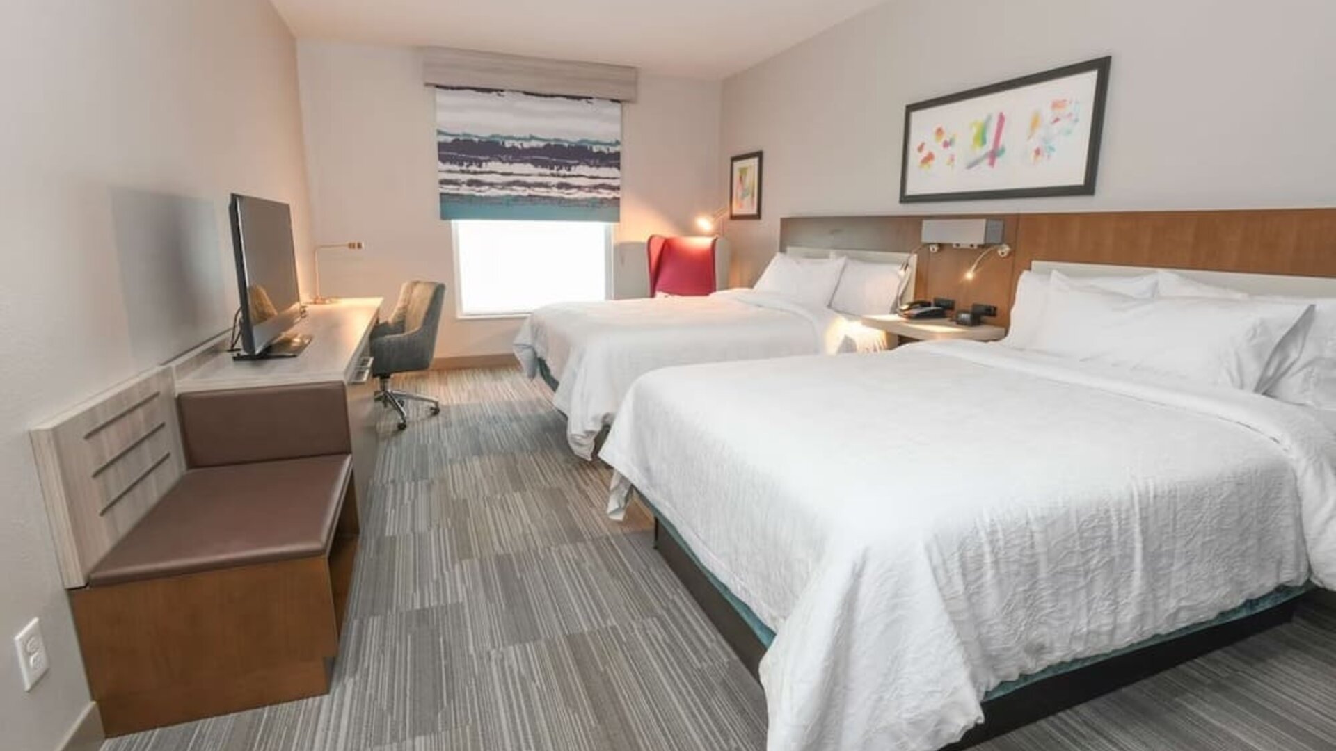 Bright and spacious day use twin room with work desk at Hilton Garden Inn Cincinnati Midtown.