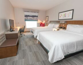 Bright and spacious day use twin room with work desk at Hilton Garden Inn Cincinnati Midtown.