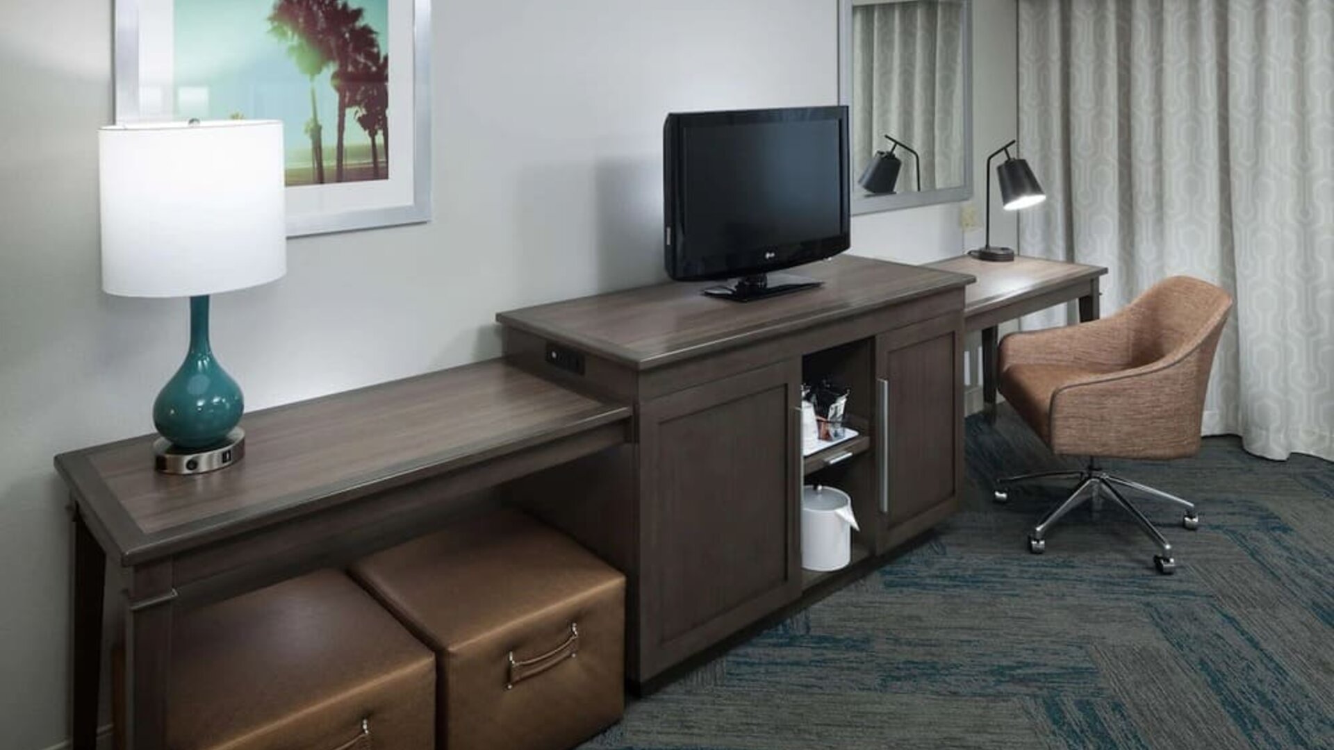 Day use room's workspace at Hampton Inn Los Angeles-Orange County-Cypress. 