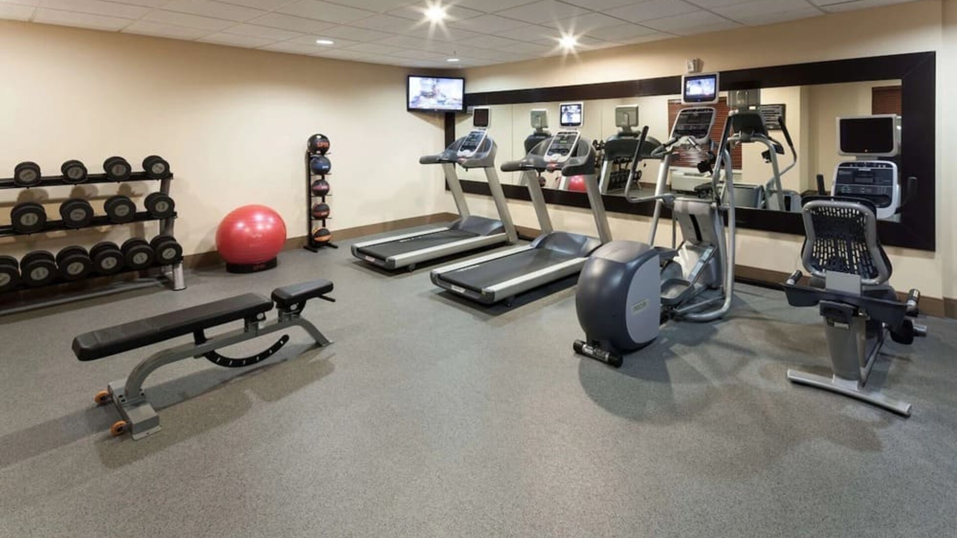 Fully equipped fitness center at Homewood Suites By Hilton Agoura Hills.