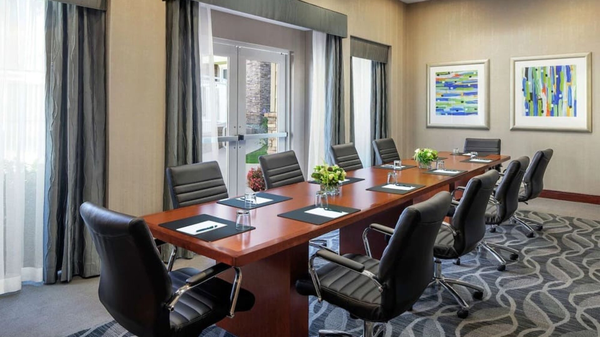 Professional meeting room with ergonomic chairs at Homewood Suites By Hilton Agoura Hills.