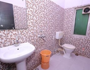 Guest bathroom at Hotel NoVo Agra.