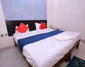 King room at Hotel NoVo Agra.