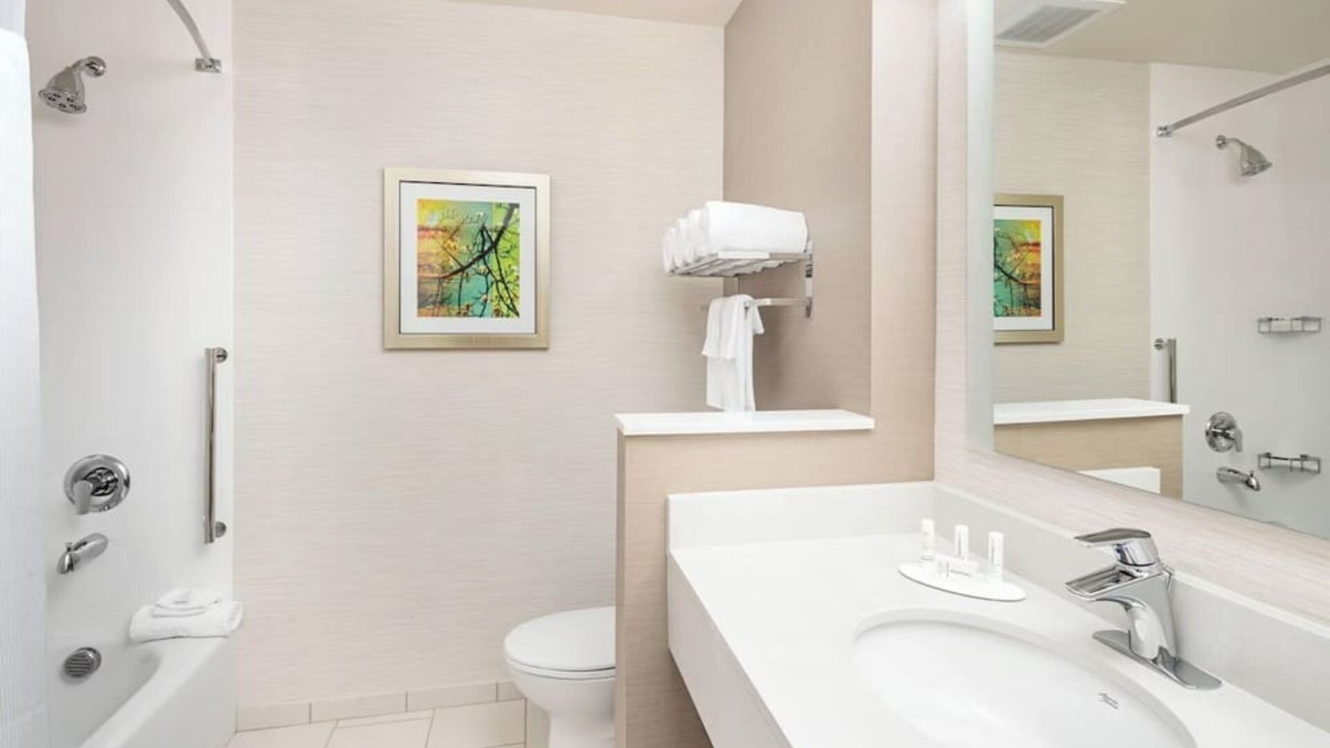 Guest bathroom with shower at Fairfield Inn & Suites By Marriott North Bergen.