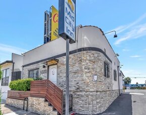 Property exterior at Mid City Inn - Los Angeles.