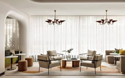 Lobby lounge and workspace at Kimpton Theta New York - Times Square.